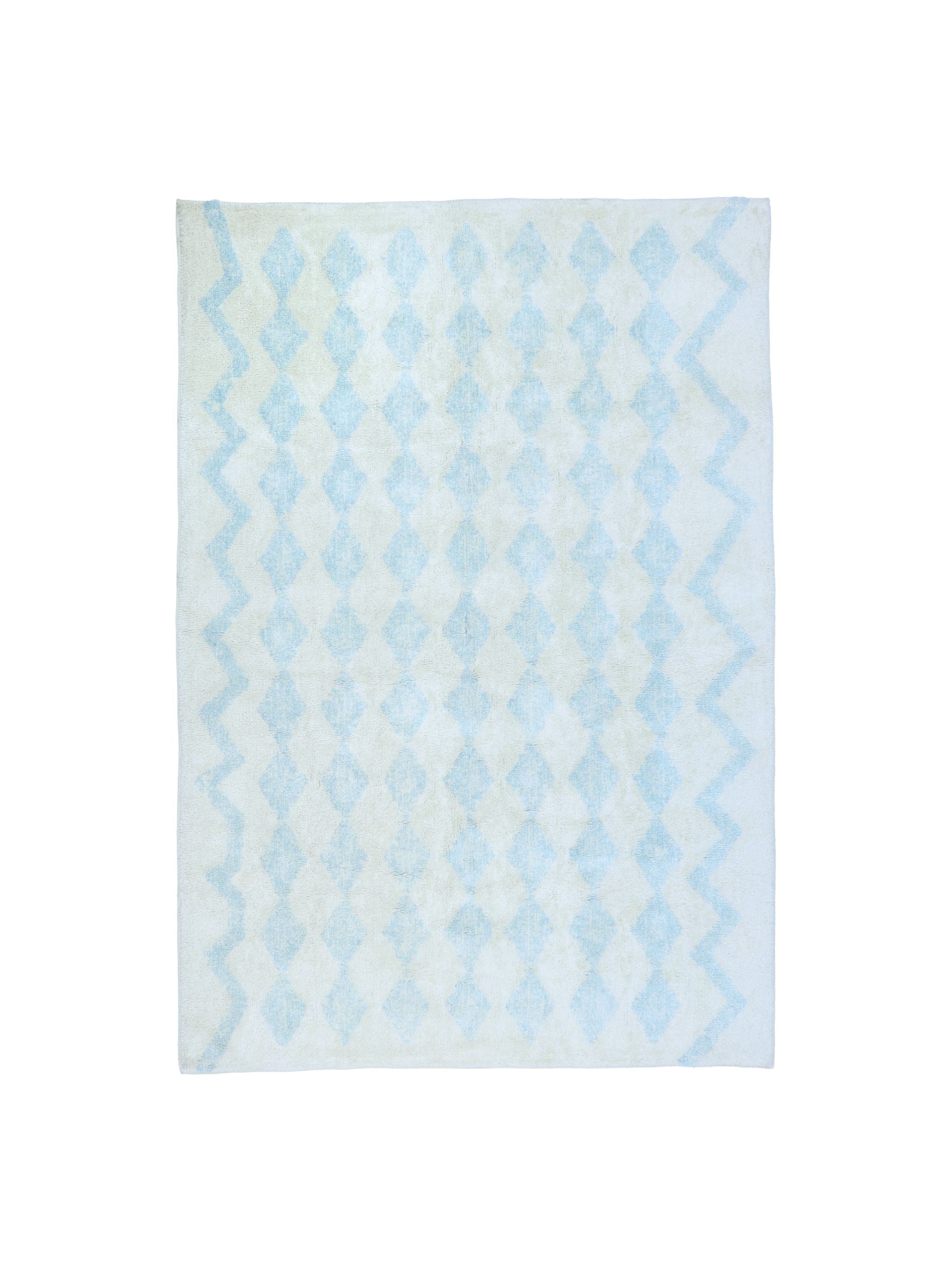 Natural rug with sky blue diamond details