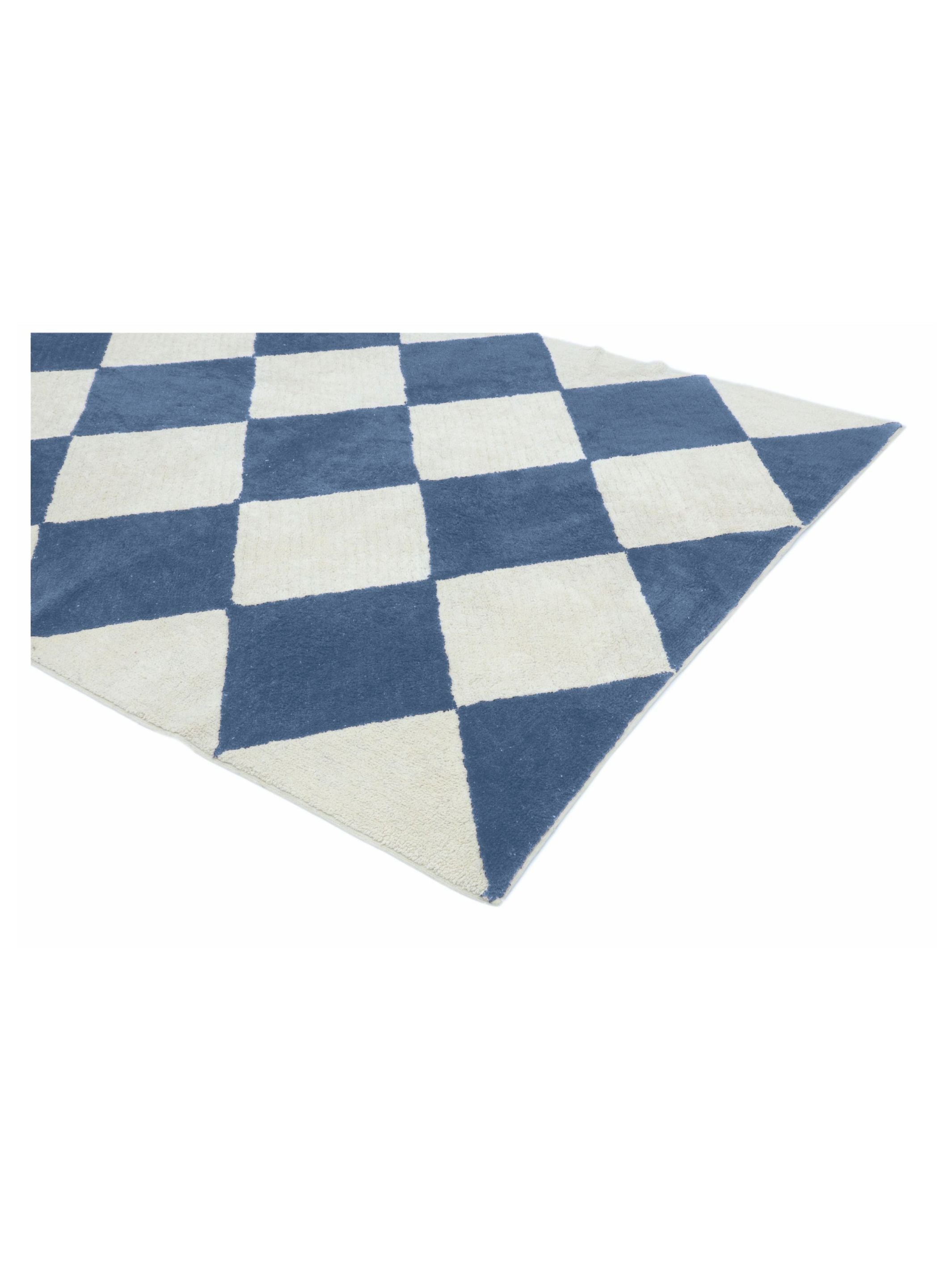 Checkered blue and white rug on a white background