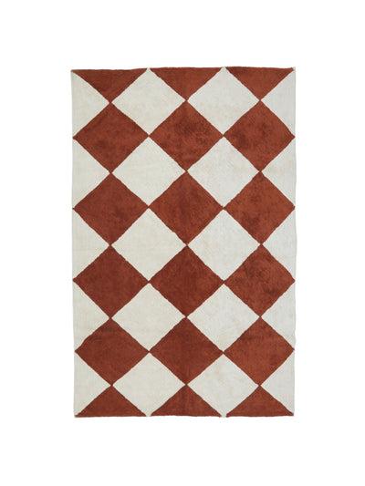 Natural rug with rust brown checker details