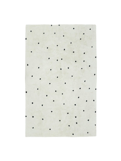 Natural rug with black dot details