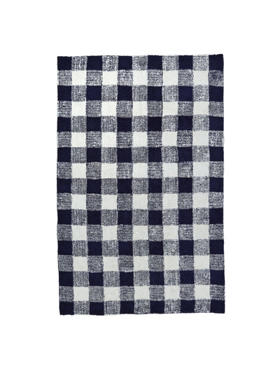 Natural rug with dark blue gingham details