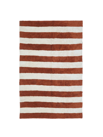 Natural rug with rust brown stripe details